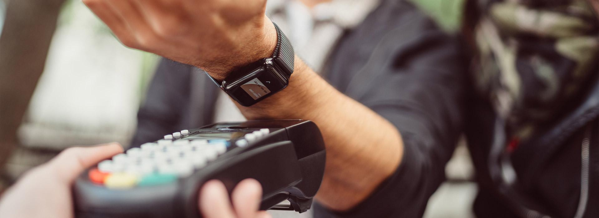 man making apple pay transaction